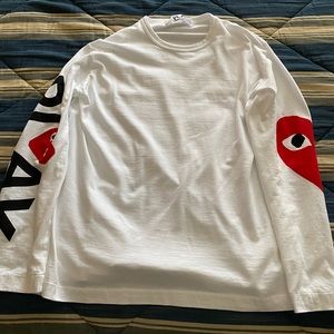 Brand new Comme Des Garsons, mens t-shirt. size XL, but fits slightly smaller.